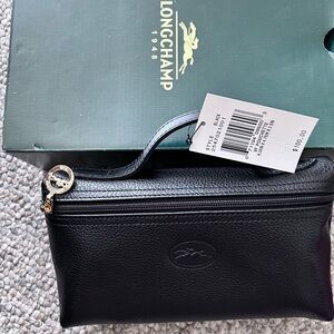 Longchamp dop kit/toiletry bag. Beautiful leather with top handle.